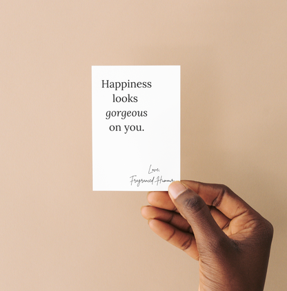 positive affirmation note with text happiness looks gorgeous on you