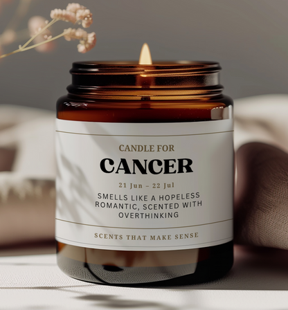 funny zodiac birthday gift for friends. candle with label that reads: candle for cancer, smells like a hopeless romantic, scented with overthinking.