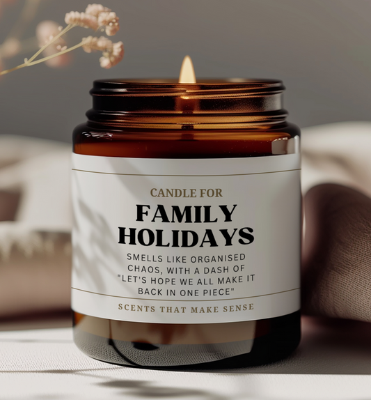 unusual birthday gift idea for friends funny candle the label reads candle for family holidays smells like organised chaos with a dash of let's hope we all make it back in one piece